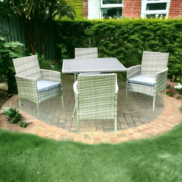 Light gray outdoor seating area, 4 seats with a glass table