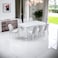 Marble dining table with 8 white chairs