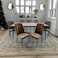 Wooden dining table with 8 brown chairs