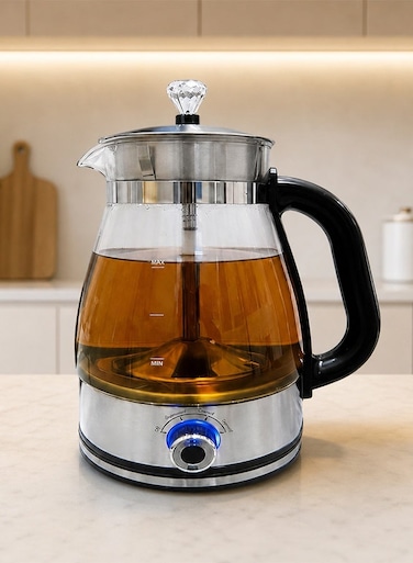 1.8L glass electric kettle with 1500W power, fast and instant boiling, removable internal tea filter, keep-warm function, automatic shut-off, and comfortable handle.