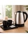 1.5L 1500W Electric Kettle with a luxurious serving base and two ceramic cups; Stainless steel kettle with a heat-resistant handle and serving base, equipped with practical storage compartments, ideal for hotels.