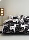 Home Single 4-piece reversible duvet cover set featuring an adorable black and white cat design.