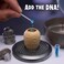MGA's Miniverse Make It Mini Dinosaurs Jurassic World, DIY Dinosaur Egg Or Hybrid Cylinder With DNA Powder, QR Code Learning Guide &amp; Display Incubator, 12 Baby Dinosaurs- 522546