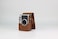 Fujifilm Instax Mini EVO Hybrid Instant Camera Brown   Fuji Instax Mini Single Pack Instant Film   32GB microSD   Camera Case - Bundle
