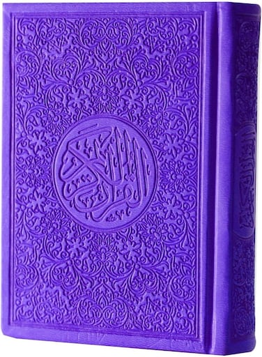 A colored Quran with colored edges, a colored cover and colored paper, small size, measuring 8*6, purple color