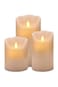 Set of 3 flickering LED flameless candles with elegant wickless design&mdash;safe, stylish home d&eacute;cor.