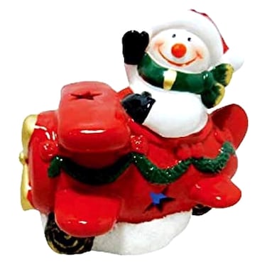 تمثال رجل الثلج في طائرة مع إضاءة لعيد الميلاد