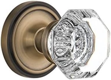 Nostalgic Warehouse Classic Rosette مع مقبض باب كريستال والدورف، ممر - 2.375 بوصة، نحاس عتيق (704824)