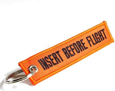 أدخل سلسلة المفاتيح قبل الطيران - برتقالي/أسود