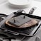 Lodge Rectangular Cast Iron Grill Press. 6.75 x 4.5" Cast Iron Grill Press with Cool-Grip Spiral Handle.