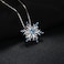 JewelryPalace Snowflake Genuine Swiss Blue Topaz Solid 925 Sterling Silver Pendant Necklace 18 Inches Box Chain