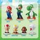 Epoch Games Super Mario Blow Up. Shaky Tower Balancing Game, Tabletop Skill and Action Game with Collectible Super Mario Action Figures.