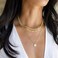 Turandoss Gold Layered Necklaces for Women - 14K Gold Plated Handmade Multilayer Bar Pearls Coin Disc Moon Butterfly Medallion Adjustable Dainty Layered Choker Necklaces for Women Jewelry.