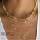 Turandoss Gold Layered Necklaces for Women - 14K Gold Plated Handmade Multilayer Bar Pearls Coin Disc Moon Butterfly Medallion Adjustable Dainty Layered Choker Necklaces for Women Jewelry.
