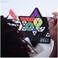 The Happy Puzzle Company Genius Star - Toy of Year Award Winning Family Board Game. 165,888 Possible by Filling in Colored Shapes with Blockers to Complete A Star. Golden Star Twist.