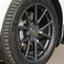 مجموعة أغطية عجلات CoolKo Tesla Aero للحواف القياسية الأصلية - أغطية مركزية - Tesla Model 3 (رمادي داكن تيتانيوم مع شعار T أحمر).