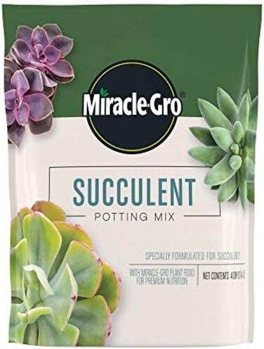 مزيج تربة Miracle-Gro لنباتات الزينة المنزلية: تربة مخصبة من البيرلايت للزراعة الداخلية، مصممة لتكون أقل عرضة للذباب.