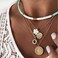 Gangel White Heishi Surfer Choker Layered Necklace Gold Flower Helios Necklace Choker Summer Pendant Jewelry for Women.