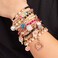 Make It Real - Juicy Couture Pink and Precious Bracelets - DIY Charm Bracelet Making Kit - Friendship Bracelet Kit with Charms, BeadsCords - ArtsCrafts Bead Kit for Girls - Makes 8 Bracelets.