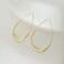 gelanmeng Lightweight Teardrop Hoop Earrings for Women - 14k Gold/White Gold Plated Large Oval Pull Through Hoop Earrings High Polished Statement Jewelry Gift for Women Teen Girls.