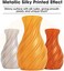 خيوط طباعة ثلاثية الأبعاد من نوع eSUN Silk Metal PLA، قطر 1.75 مم، خيوط طباعة ثلاثية الأبعاد معدنية حريرية، دقة أبعاد ± 0.05 مم، بكرة وزنها 1 كجم (2.2 رطل)، لون نحاسي حريري.