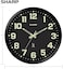 SHARP Glow in The Dark Atomic Analog Wall Clock - 12" Clock with Black Frame - Sets Automatically - Battery Operated - Easy to Read - Easy to Use &ndash; See Day or Night!