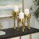 Deco 79 CosmoLiving by Cosmopolitan Aluminum Pillar Candle Holder with Dripping Melting Designed Legs, 12", 10", 8"H, Gold, SMALL SIZE, Set of 3