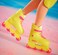 Barbie The Movie Ken - Collectable Doll In Neon Outfit, Skating Look, Retro Pattern, Impala Inline Skates, Packing with Feature Film Motifs, For Children From 3 Years, Hrf28