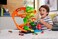​Hot Wheels Toy Car Track Set, City T-Rex Blaze Battle Playset &amp; 1:64 Scale Die-Cast Firetruck, 18&rdquo; Tall, Multiple Race Outcomes, Spinning Dinosaur Eyes