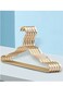 A golden clothes hanger consisting of 5 pieces, for more organized and easier use.