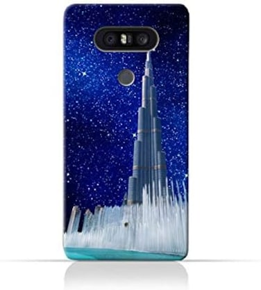 جراب حماية سيليكوني من مادة TPU لهاتف LG Q8 بتصميم برج خليفة ونافورة مياه في ليلة مرصعة بالنجوم