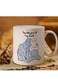 Ceramic Mug with Arabic Calligraphy &amp; Whimsical Blue Creature Design in white