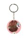Girl With Flower Themed Keychain