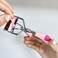 Stainless Steel Eyelash Curler with Builtin Comb Pinch PainFree Suitable for Any Eye Shapes and Sizes with 5 Silicone Refill Pads Light Pink