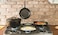 Lodge 2 Quart PreSeasoned Cast Iron Dutch Oven with Lid  Dual Handles  Use in the Oven on the Stove on the Grill or over the Campfire  Black