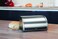 Brabantia Medium Roll Top Bread Box Matt Steel Large Grip Front Opening Partially Flat Top Bread Box Fits 1 Loaf Ideal for Kitchen Counter