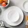 Corelle Vitrelle 18Piece Service for 6 Dinnerware Set Triple Layer Glass and Chip Resistant Lightweight Round Plates and Bowls Set Winter Frost White