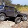 Axial SCX10 II UMG10 6x6 RC Rock Crawler RTR with 24Ghz Radio System Battery and Charger Not Included 110 Scale AXI03002Charcoal Metallic