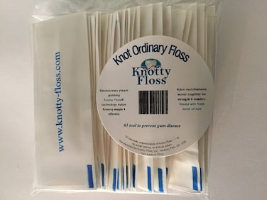 Knotty Floss Individually Wrapped Fresh Mint Waxed Nylon Floss  Patented Plaque Grabbing Technology  Vegan  50 Count