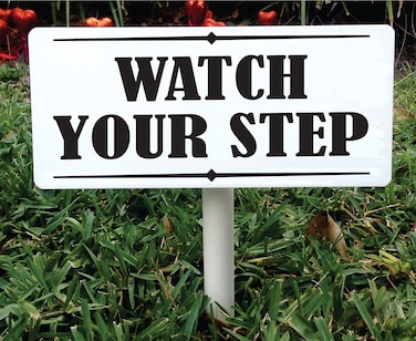 Watch your step sign with stake. 3.5 x 9 inch PVC