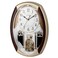 CUYOU Musical Motion Chime Wall Clock with Rotating Pendulum, Decorative Wall Clock, 18 Melodies, for Home, Hotel, Library or Church Decor.