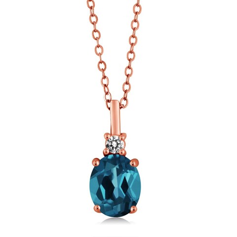Gem Stone King 18K Rose Gold Plated Silver London Blue Topaz &amp; Diamond Pendant Necklace For Women   1.87 Cttw   Gemstone Birthstone   Oval 9X7MM   With 18 Inch Chain