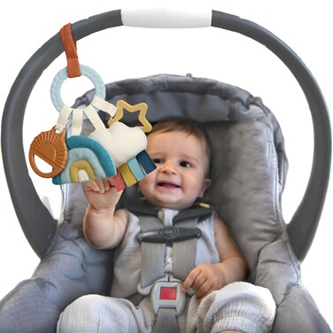 Itzy Ritzy Teething Activity Toy - Bitzy Busy Ring Infant Teething Toy Features Braided Ring &amp; Dangling Toys, Includes Teether, Textured Ribbons, Crinkle Sound &amp; Jingle Bell - 0 Months &amp; Up (Rainbow)