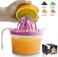 Zulay Kitchen 3-in-1 Manual Citrus Juicer Reamer Cup - 17OZ Multifunction Lemon Squeezer, Orange Juicer Squeezer &amp; Citrus Extractor - Includes 2 Reamers, Strainer &amp; Measuring Cup with Handle (Pink)