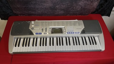 Casio CTK-496 Electronic Keyboard with 61 Full-Size Keys and Singalong Capability