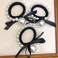 AKOAK 2 Pieces Black Bow Pearl Scrunchie, Elastic Hair Rubber Band Ribbon, Ponytail Holder Temperament Personality Girl Pearl Bun Rope for Women and Girls