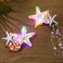 JAKAWIN Light Up Starfish Hair Clips LED Mermaid Costume Hair Barrettes Seashell Ocean Glowing Hair Accessories for Women (2 PCS)