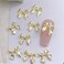 Bow Nail Art Charm 40PCS Gold Metal Bow Nail Charms 3D Alloy Bow-Knot Nail Art Decorations Kawaii Bow Charms for Nails Cute Ribbon Nail Jewelry Accessories for Acrylic Nails DIY Manicure Decor
