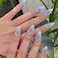 MERVF Almond Press on Nails Medium Fake Nails Blue Gradient Stiletto Acrylic with Star Rhinestones Design Glue ons Glossy Aura False Nail 24pcs