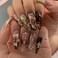 SEENEEY Long Press on Nails Almond Fake Nails Brown False Nails Flowers Artificial Nails with Gold Charm Designs Summer Handmade Nails 3D Floral Stick on Nails for Women 24pcs